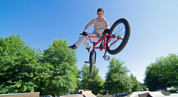 Doing tricks on bike bikes in Flip Rider - BMX Tricks on the background ...